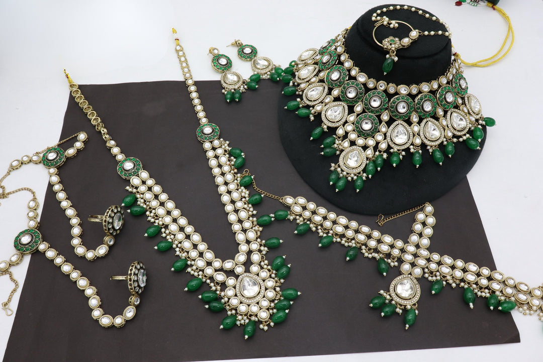 Kirti Full Kundan Bridal Set (1 Choker, 1 Long Necklace, 1 Earring Pair, 1 Pair Hath Panja, Nath, Mathapatti)