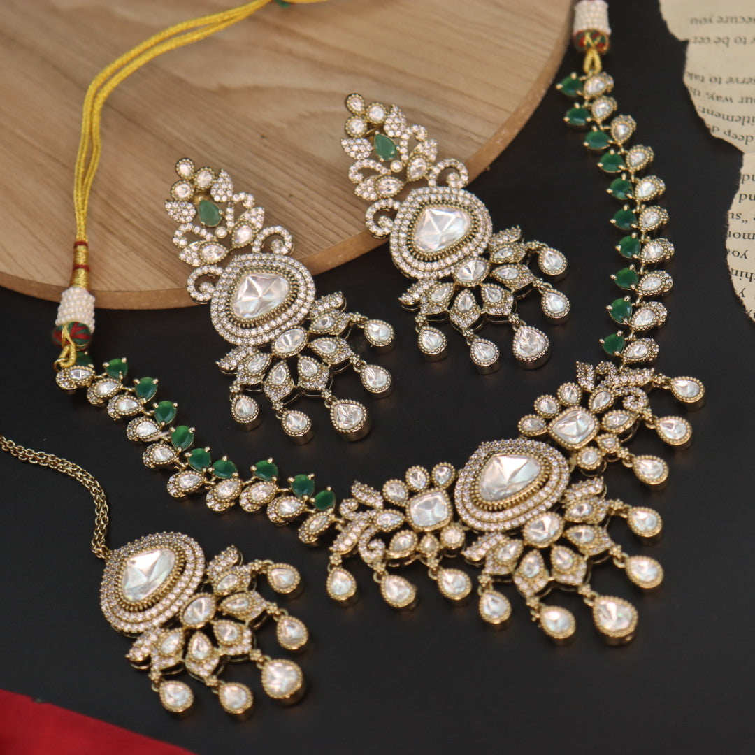 Radha Designer Moissante Set With Earrings And Mangtika-Green