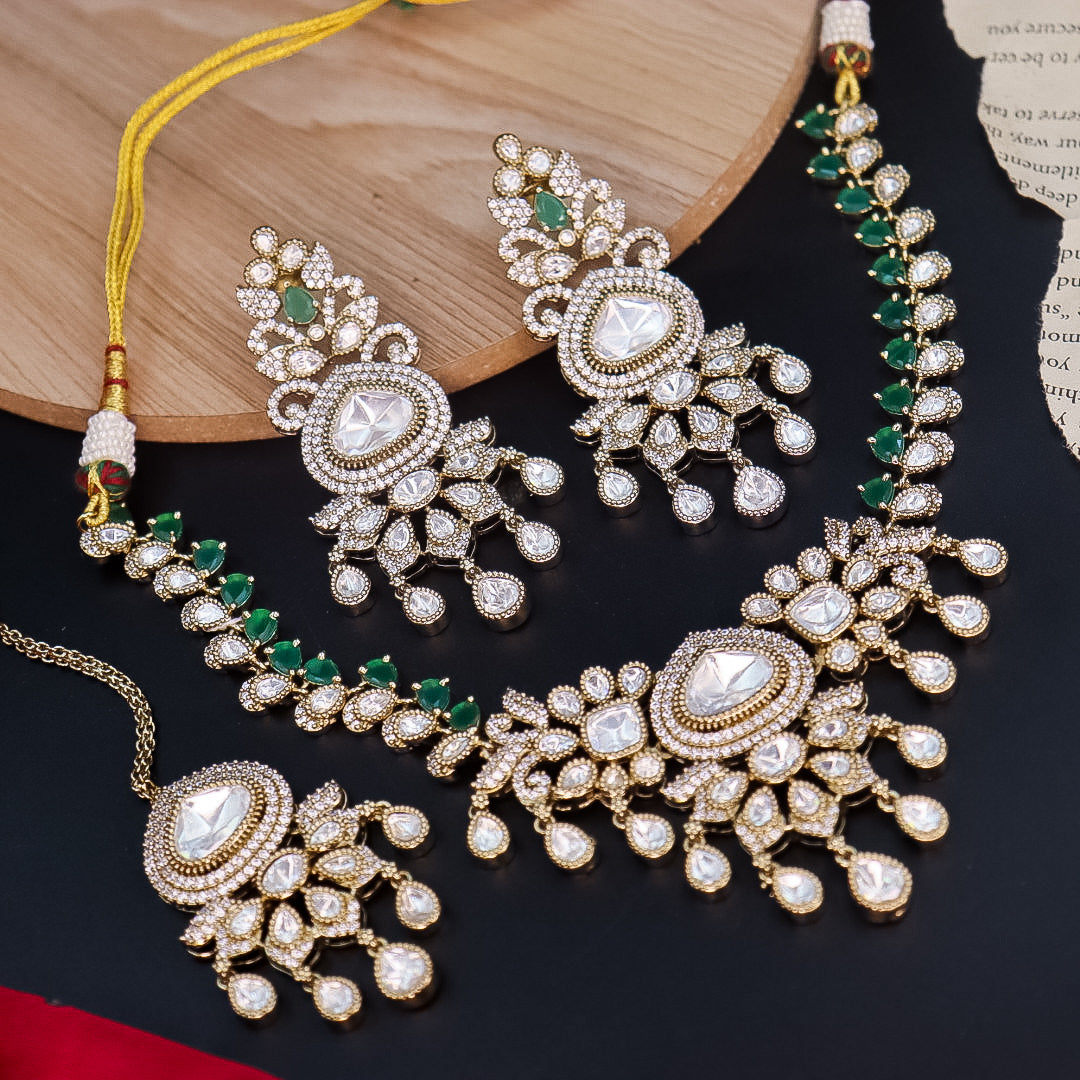 Radha Designer Moissante Set With Earrings And Mangtika-Green