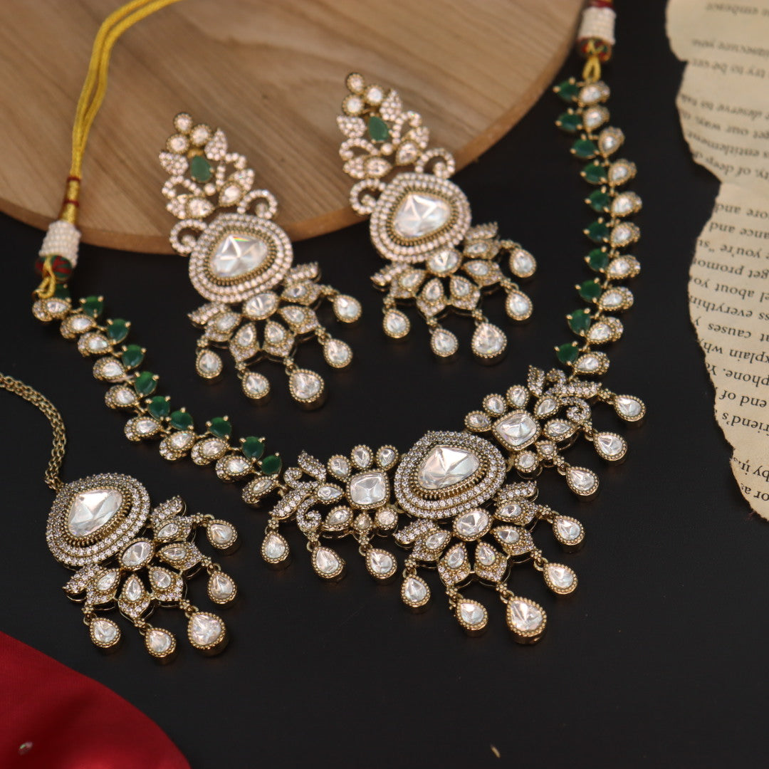 Radha Designer Moissante Set With Earrings And Mangtika-Green