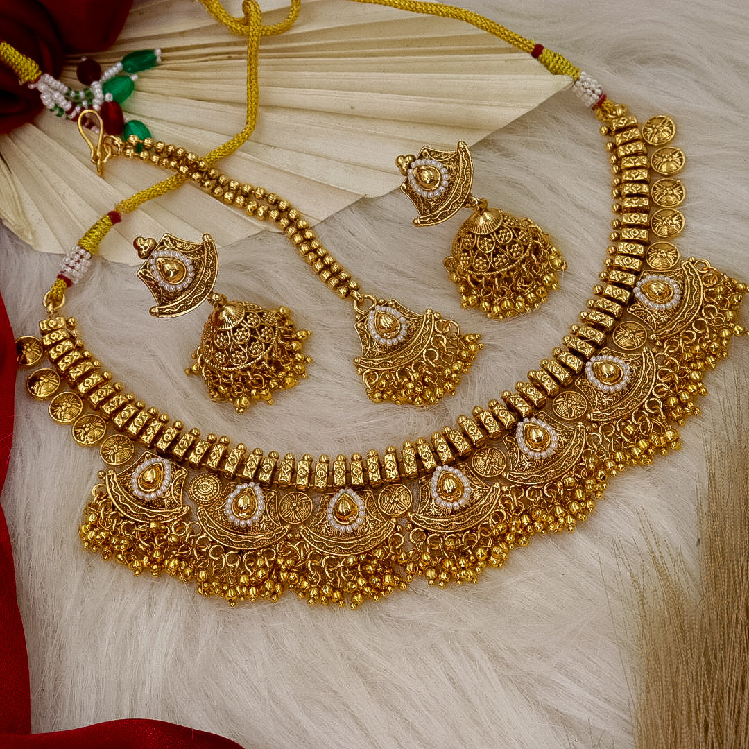 Yuma Trending Golden  Necklace With Earrings And Mangtika